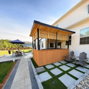 Backyard with patio, pathway, and covered bar area