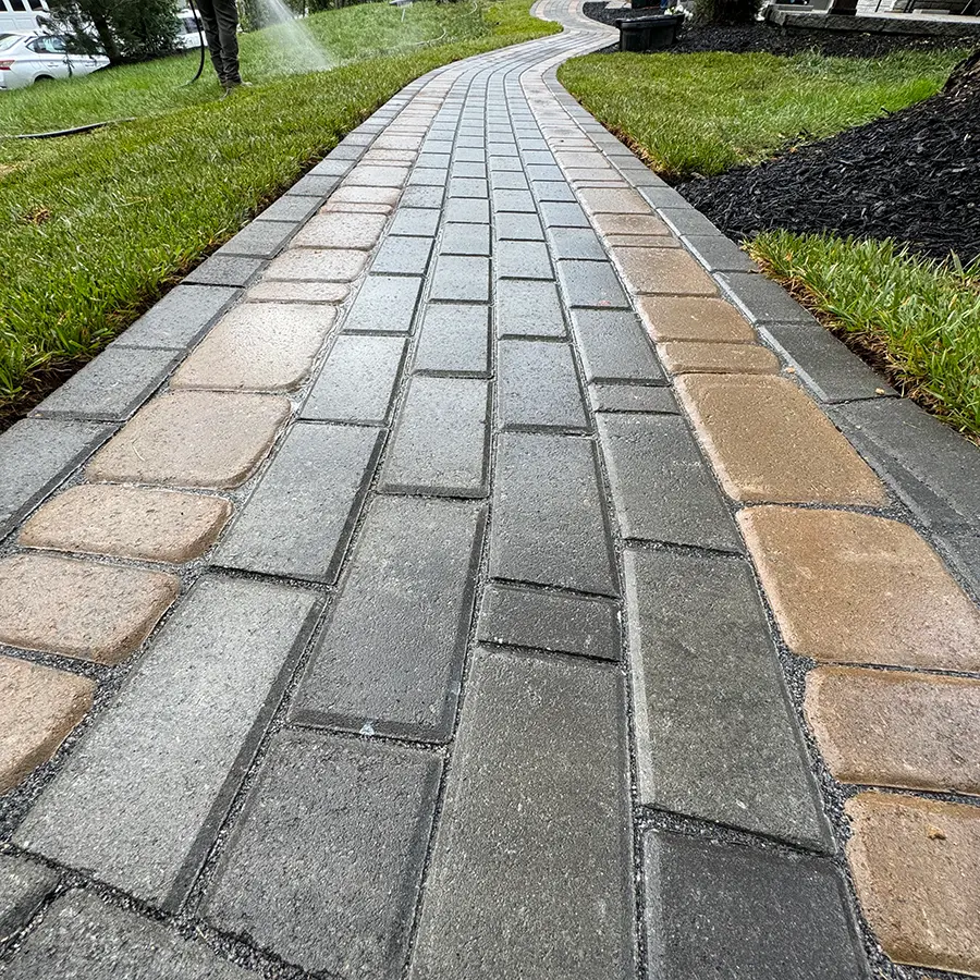 Close up of backyard brick pathway
