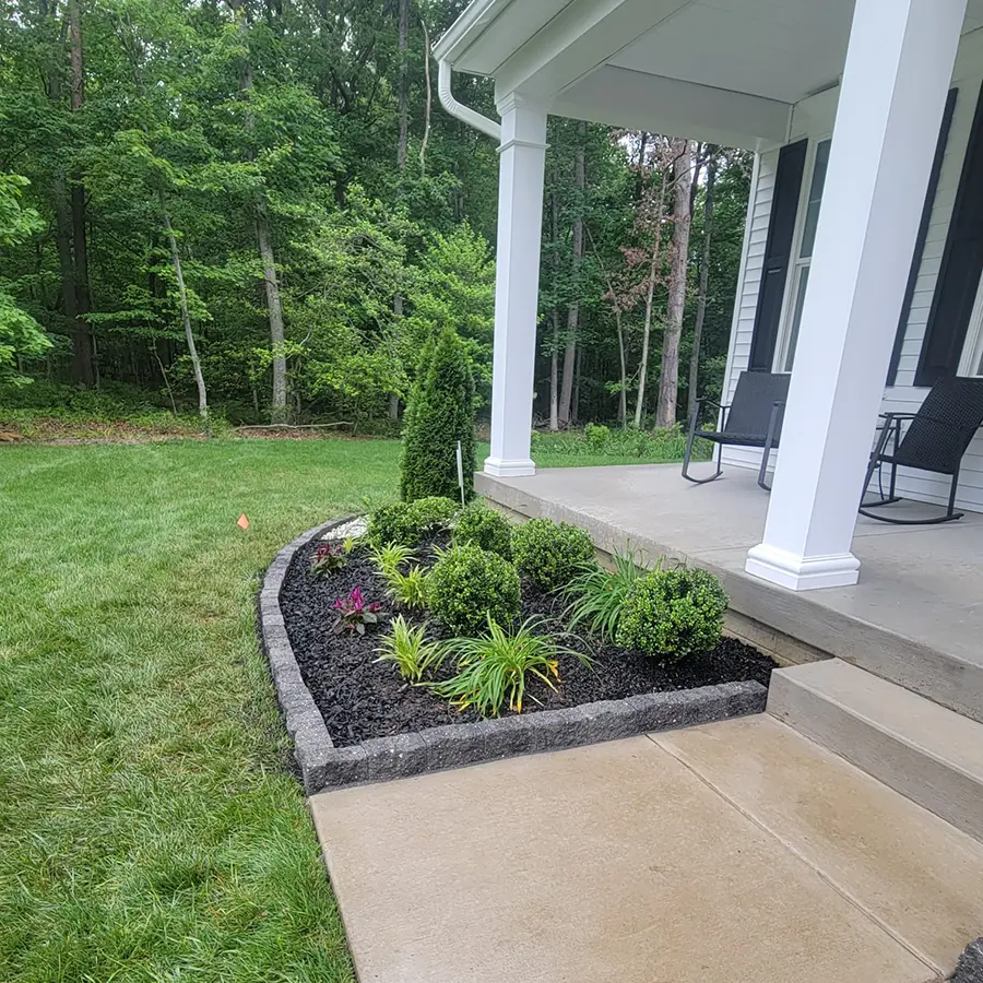 Front yard with landscaped planter